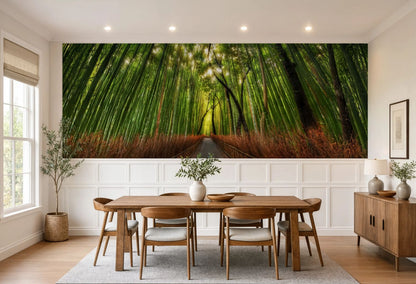 Lush green jungle wallpaper featuring tall vertical bamboo stalks and a pathway.