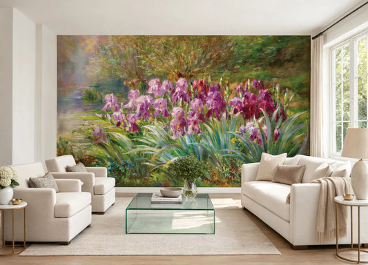 A 19th-century oil painting wall mural by Edmond Allouard featuring a lush garden of blooming purple and pink irises by a misty stream with willow trees.