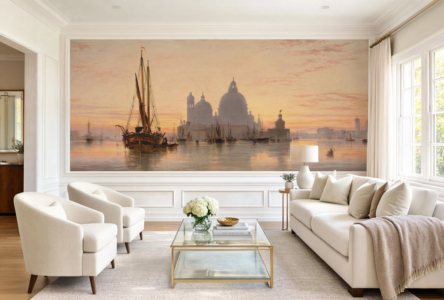 An 1851 oil painting wall mural by Edward William Cooke showing a warm golden sunset over the Venice lagoon with historic ships and a misty cathedral dome behind.