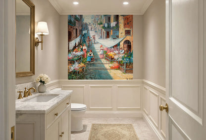 Square 60x60 inch vintage Italian street wallpaper installed above white wainscoting in a cozy powder room.
