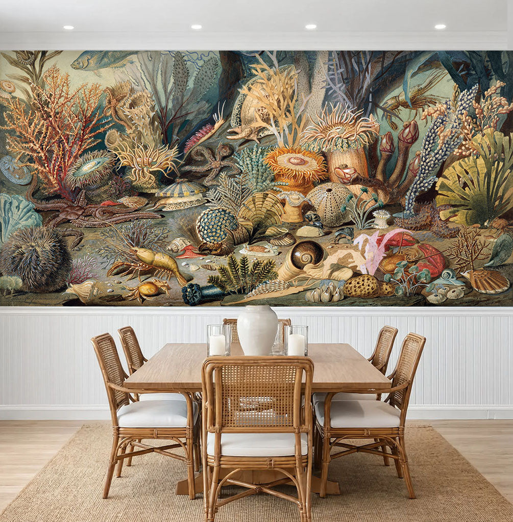 Vintage sea life classical painting wall mural installed above white wainscoting in a dining room
