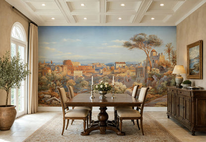 A large wall mural depicting a classical landscape city scene with trees, ruins, and a blue sky, shown in a styled dining room with a wooden table, chairs, sideboard, and arched window.