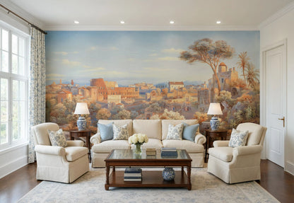 A styled living room featuring a large classical landscape mural on the back wall, with a cream sofa, two matching armchairs, a wooden coffee table, and lamps on side tables.