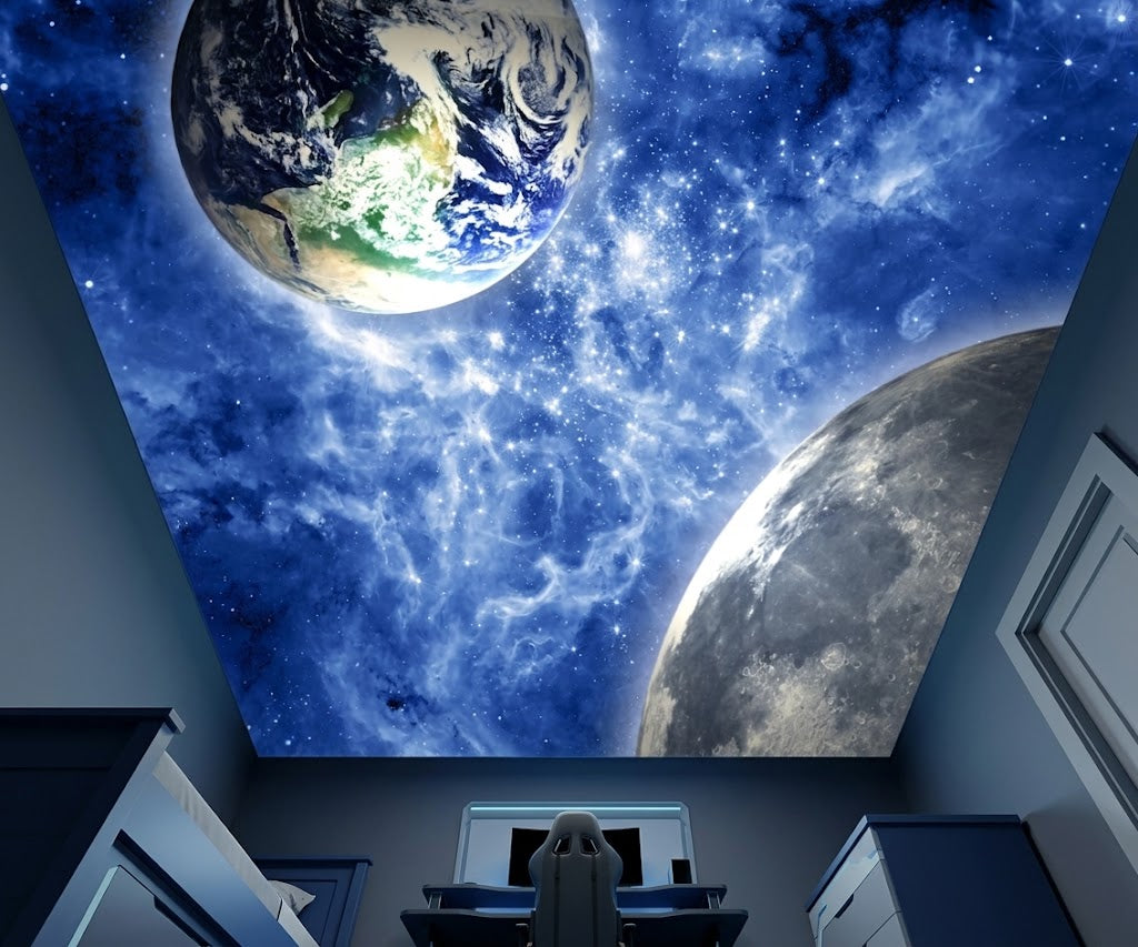 A ceiling mural depicting a starry outer space scene with Earth and the Moon, shown installed in a gaming room.
