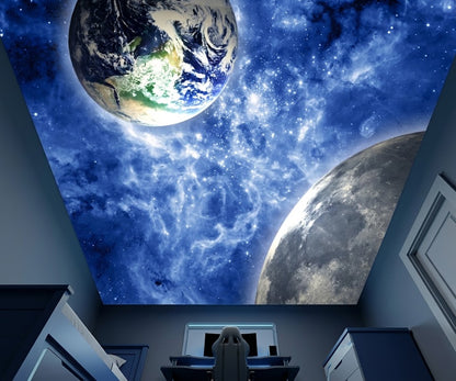A ceiling mural depicting a starry outer space scene with Earth and the Moon, shown installed in a gaming room.