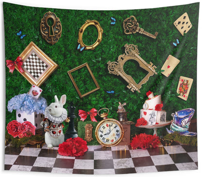 A square wall tapestry featuring a whimsical Alice in Wonderland themed scene with a green foliage background, gold frames, playing cards, a chess piece, a rabbit, a teapot, and a checkered floor.