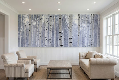 A large wall mural depicting a winter birch forest with white and gray tree trunks.