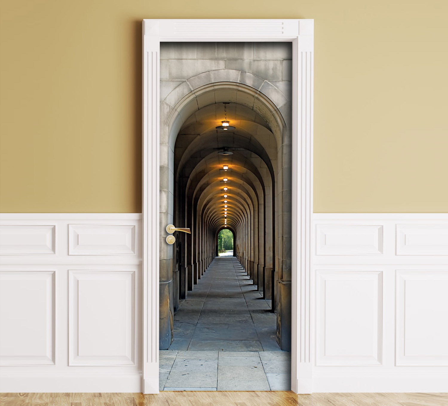 A wall mural depicting a stone arch corridor tunnel, shown installed in a room with beige upper walls, white wainscoting, and a wood floor.