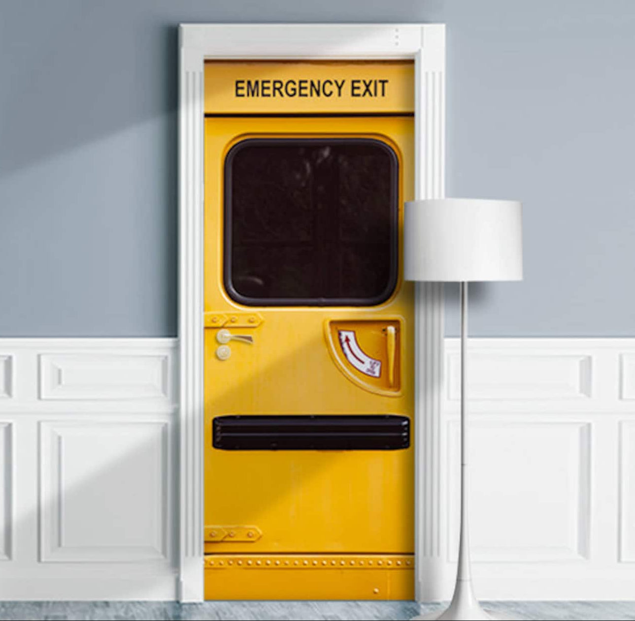 Yellow emergency exit door with black text on a gray wall.