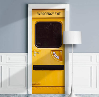 Yellow emergency exit door with black text on a gray wall.
