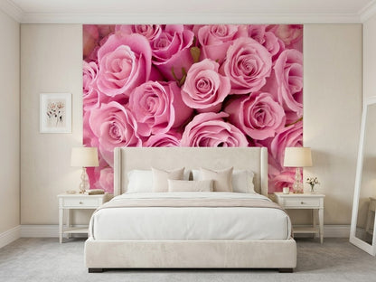 Lightweight pink floral tapestry wall hanging displayed in a modern bedroom setting.