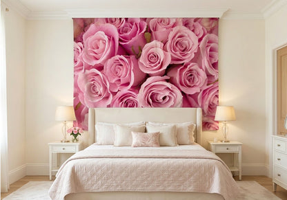 Soft pink roses fabric wallcovering hung as an accent piece above a bed frame.