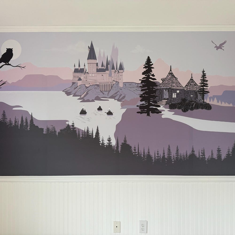 Wall mural of a castle by a lake with trees, on a plain wall.