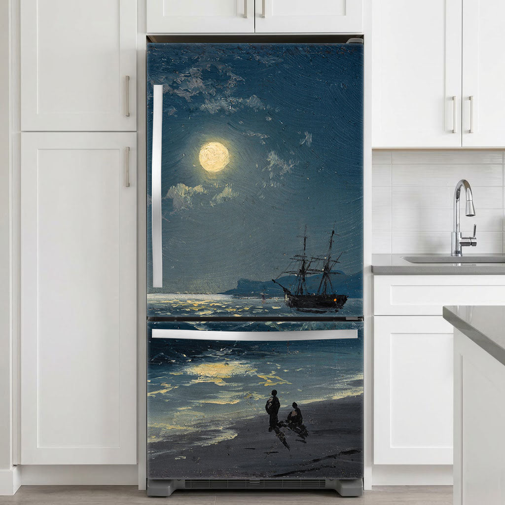 Fridge with a decorative decal of a ship on a moonlit sea in a kitchen.