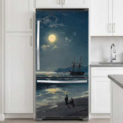 Fridge with a decorative decal of a ship on a moonlit sea in a kitchen.