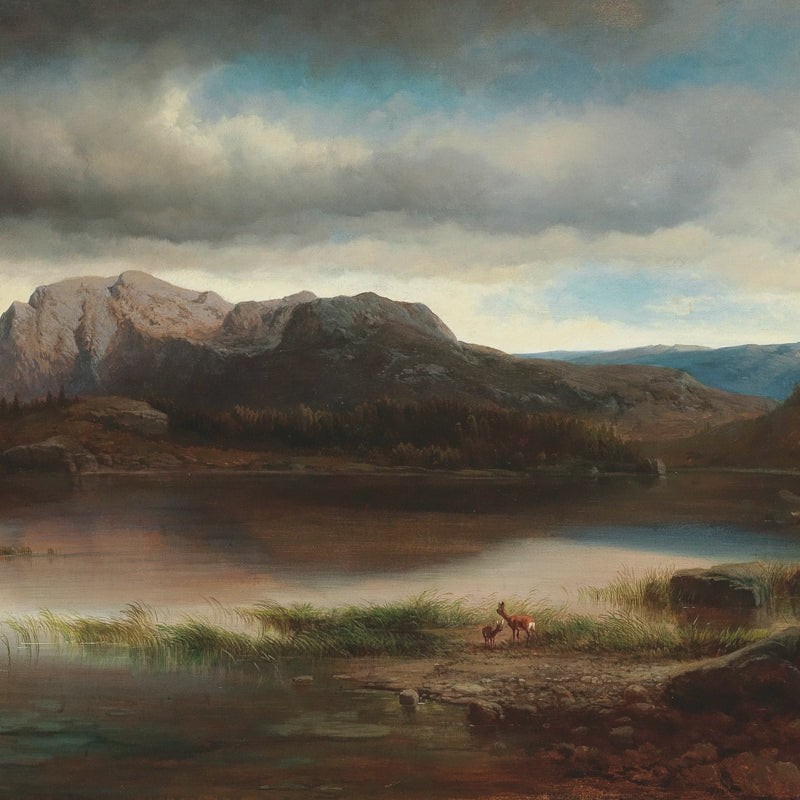 Panoramic evening mountain fjord view mural framed above wooden chair rail molding in a moody home office.