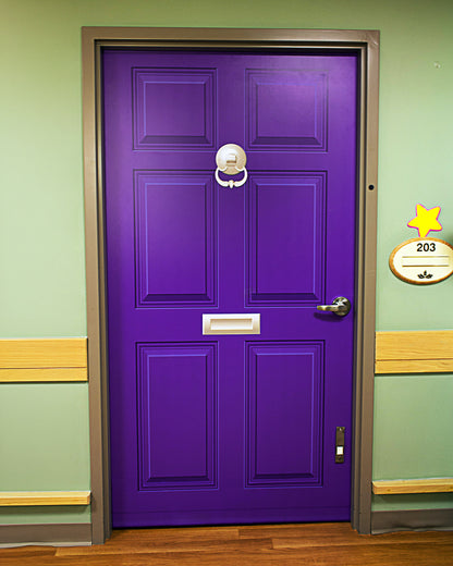 Purple door wrap with a gold handle for dementia friendly homes