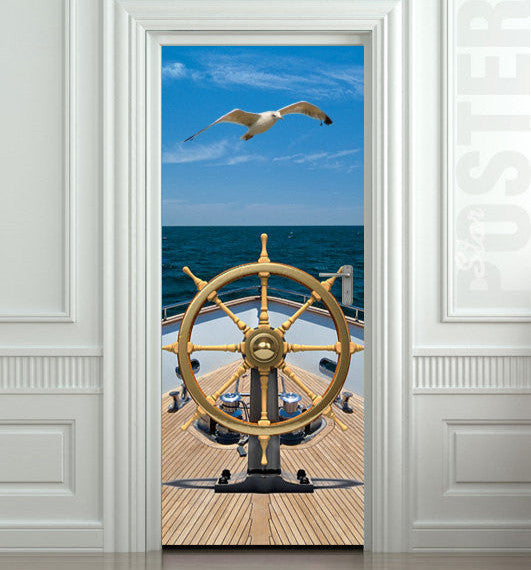 Old ship with steering wheel in the sea with blue sky and flying bird